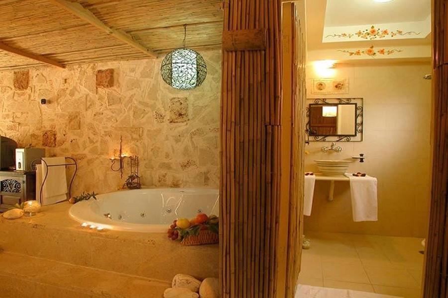 Hotel ביקתפוז וקלמנטינה- מתחם בקתות וסוויטות עם ג'קוזי פרטי ובריכה משותפת Liman Camera foto